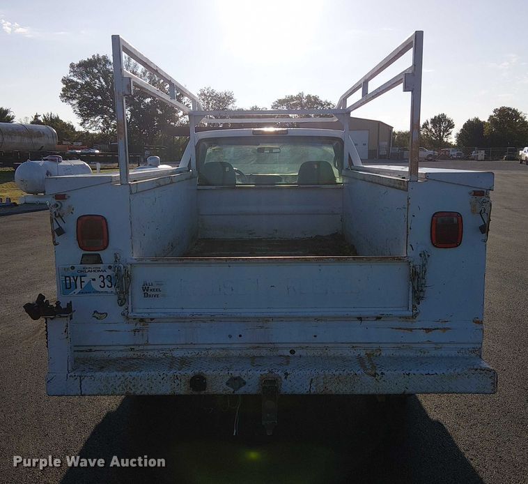 image for item DJ7859 1999 GMC Sierra 2500 utility bed pickup truck