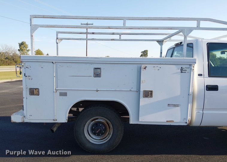 image for item DJ7859 1999 GMC Sierra 2500 utility bed pickup truck