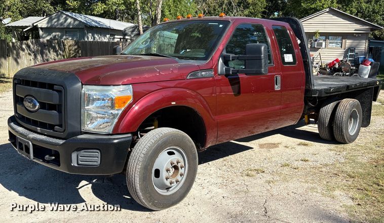 image for item EA6989 2012 Ford F350 Super Duty SuperCab flatbed pickup truck