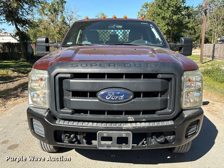 image for item EA6989 2012 Ford F350 Super Duty SuperCab flatbed pickup truck
