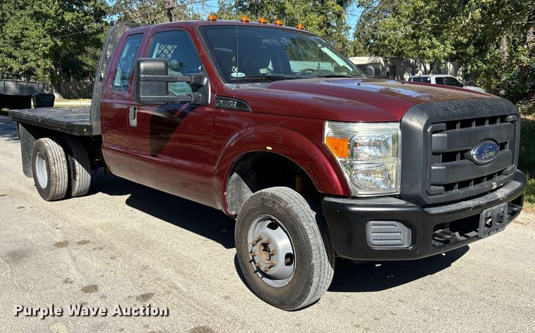 image for item EA6989 2012 Ford F350 Super Duty SuperCab flatbed pickup truck