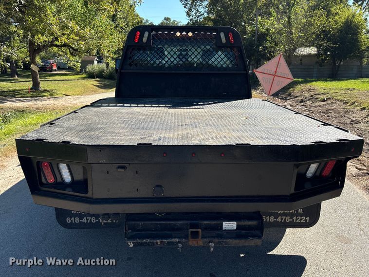 image for item EA6989 2012 Ford F350 Super Duty SuperCab flatbed pickup truck