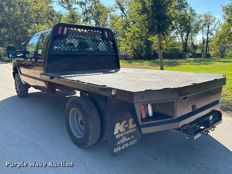 image for item EA6989 2012 Ford F350 Super Duty SuperCab flatbed pickup truck