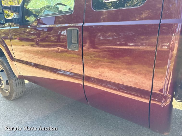 image for item EA6989 2012 Ford F350 Super Duty SuperCab flatbed pickup truck