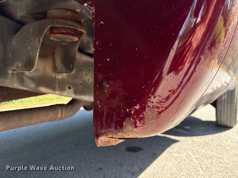 image for item EA6989 2012 Ford F350 Super Duty SuperCab flatbed pickup truck