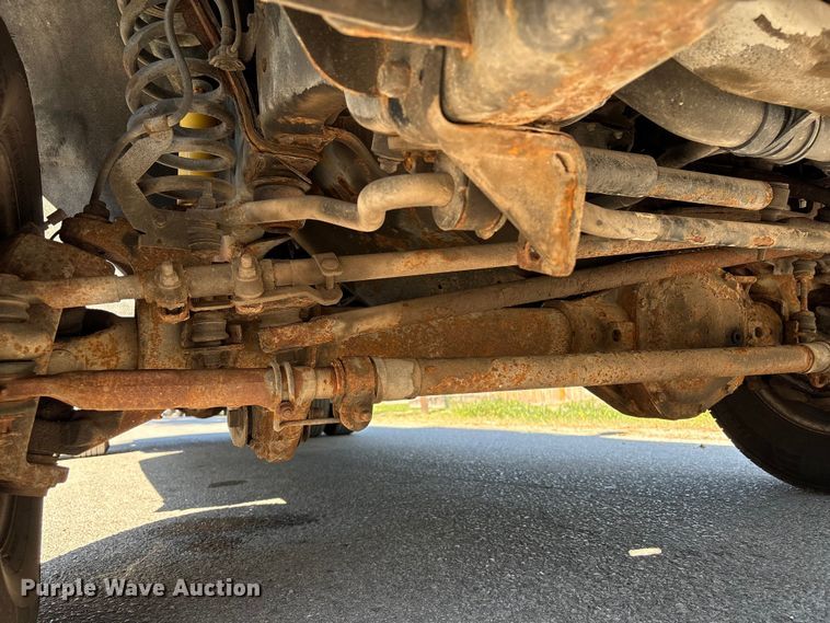 image for item EA6989 2012 Ford F350 Super Duty SuperCab flatbed pickup truck