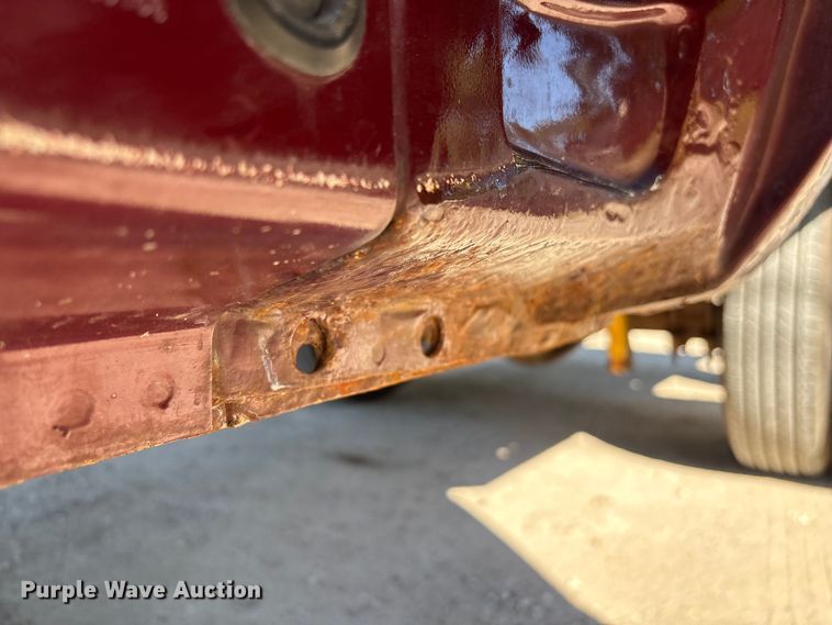 image for item EA6989 2012 Ford F350 Super Duty SuperCab flatbed pickup truck