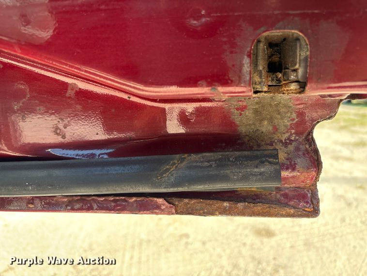 image for item EA6989 2012 Ford F350 Super Duty SuperCab flatbed pickup truck