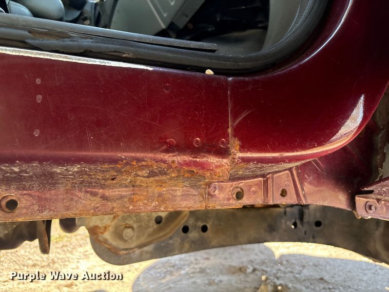 image for item EA6989 2012 Ford F350 Super Duty SuperCab flatbed pickup truck