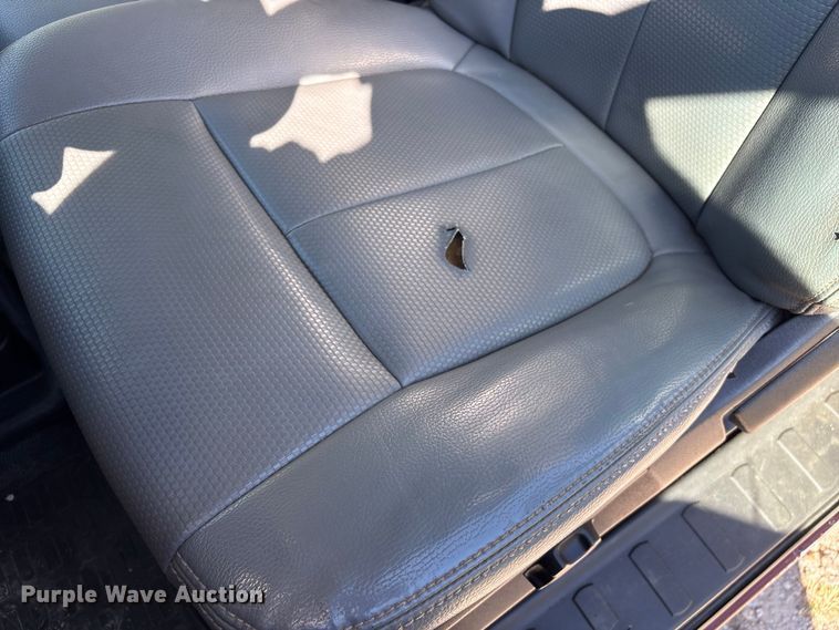 image for item EA6989 2012 Ford F350 Super Duty SuperCab flatbed pickup truck