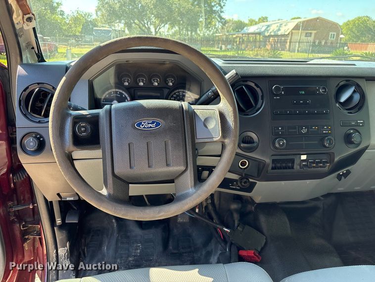 image for item EA6989 2012 Ford F350 Super Duty SuperCab flatbed pickup truck