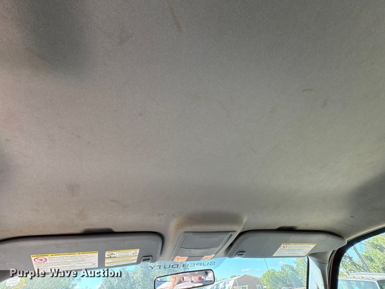 image for item EA6989 2012 Ford F350 Super Duty SuperCab flatbed pickup truck