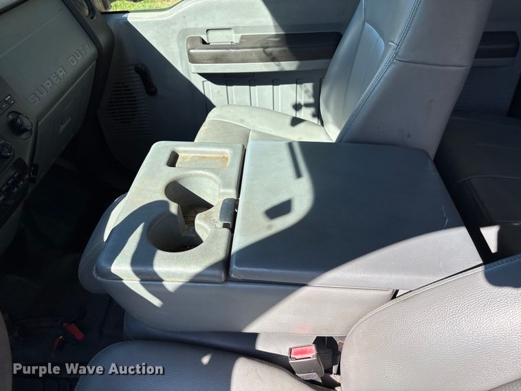 image for item EA6989 2012 Ford F350 Super Duty SuperCab flatbed pickup truck