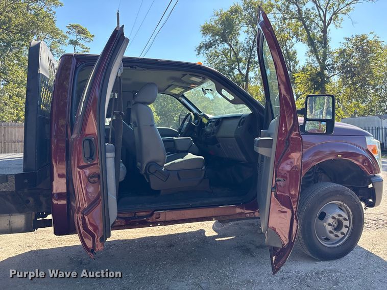 image for item EA6989 2012 Ford F350 Super Duty SuperCab flatbed pickup truck