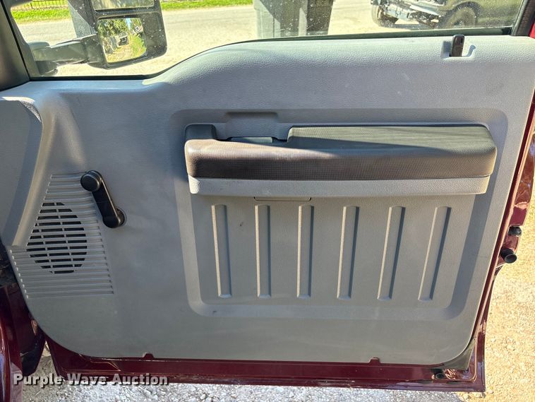 image for item EA6989 2012 Ford F350 Super Duty SuperCab flatbed pickup truck