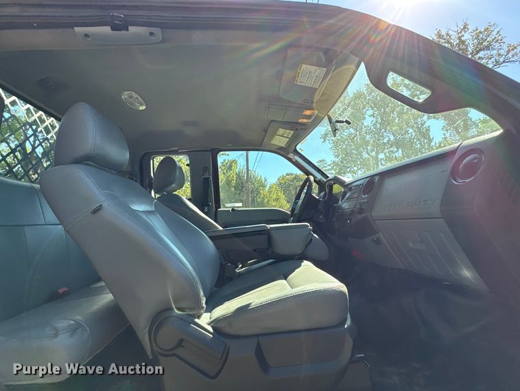 image for item EA6989 2012 Ford F350 Super Duty SuperCab flatbed pickup truck