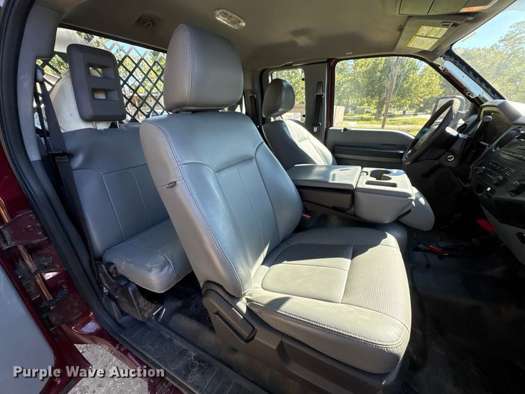 image for item EA6989 2012 Ford F350 Super Duty SuperCab flatbed pickup truck