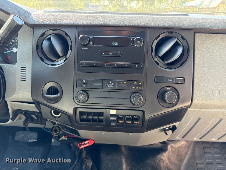 image for item EA6989 2012 Ford F350 Super Duty SuperCab flatbed pickup truck