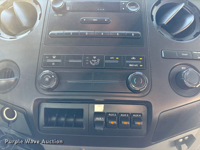 image for item EA6989 2012 Ford F350 Super Duty SuperCab flatbed pickup truck