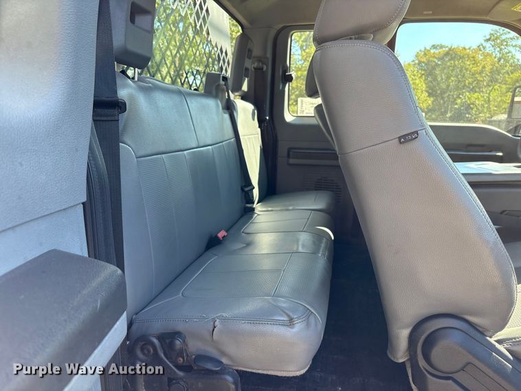 image for item EA6989 2012 Ford F350 Super Duty SuperCab flatbed pickup truck