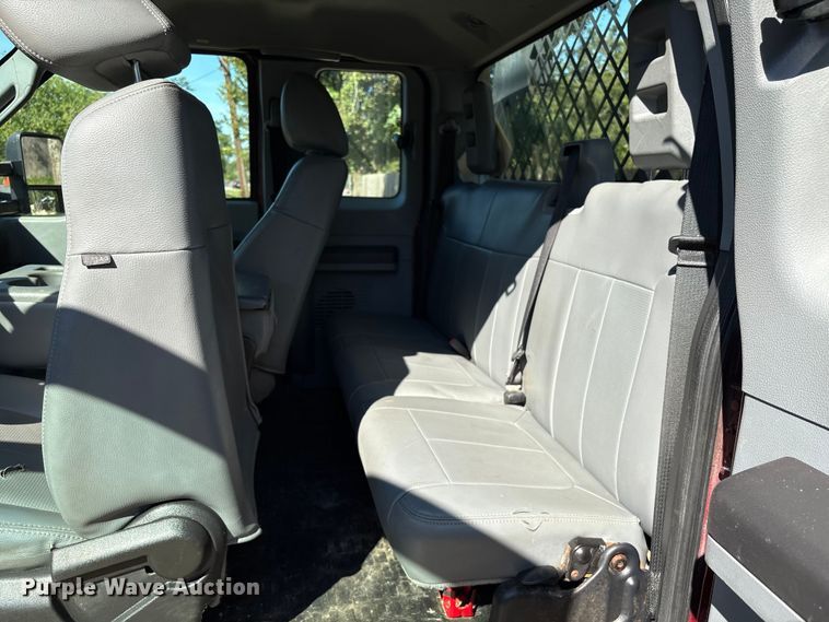 image for item EA6989 2012 Ford F350 Super Duty SuperCab flatbed pickup truck