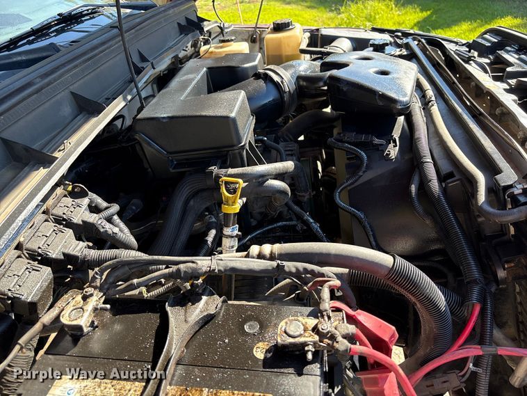 image for item EA6989 2012 Ford F350 Super Duty SuperCab flatbed pickup truck