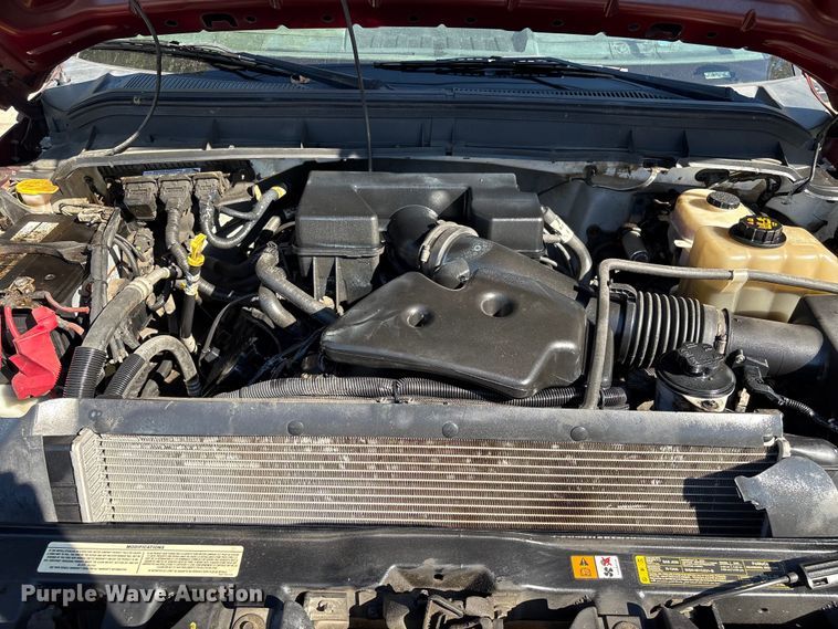 image for item EA6989 2012 Ford F350 Super Duty SuperCab flatbed pickup truck