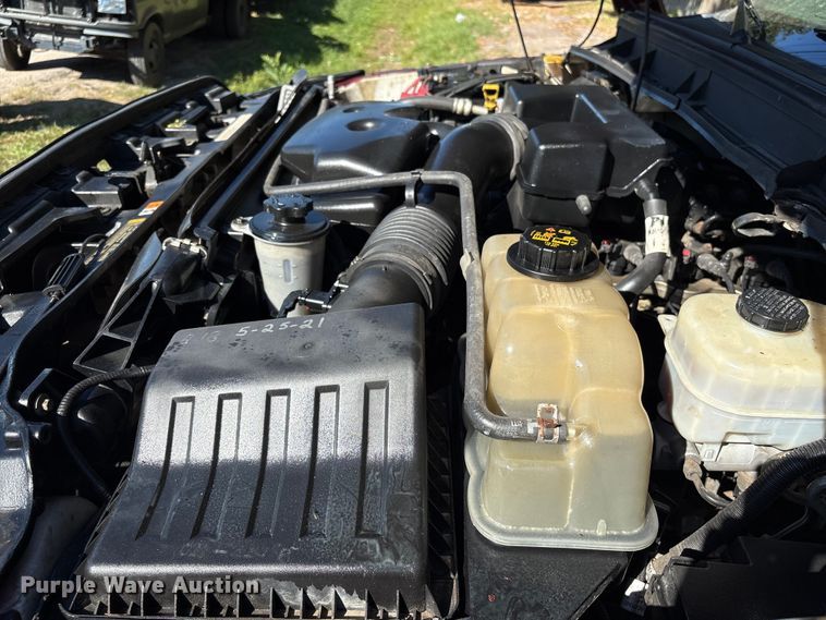 image for item EA6989 2012 Ford F350 Super Duty SuperCab flatbed pickup truck