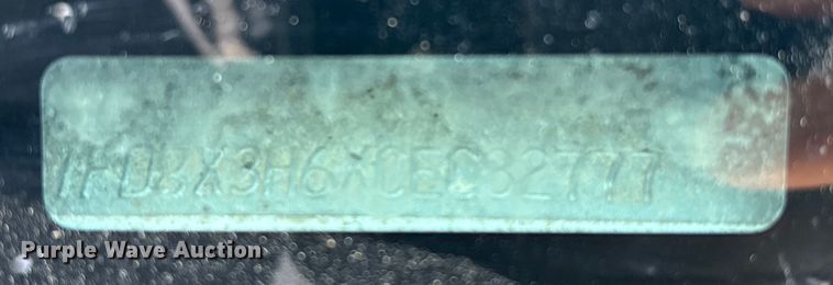 image for item EA6989 2012 Ford F350 Super Duty SuperCab flatbed pickup truck