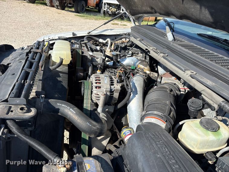 image for item EA7596 1999 Ford F450 flatbed truck