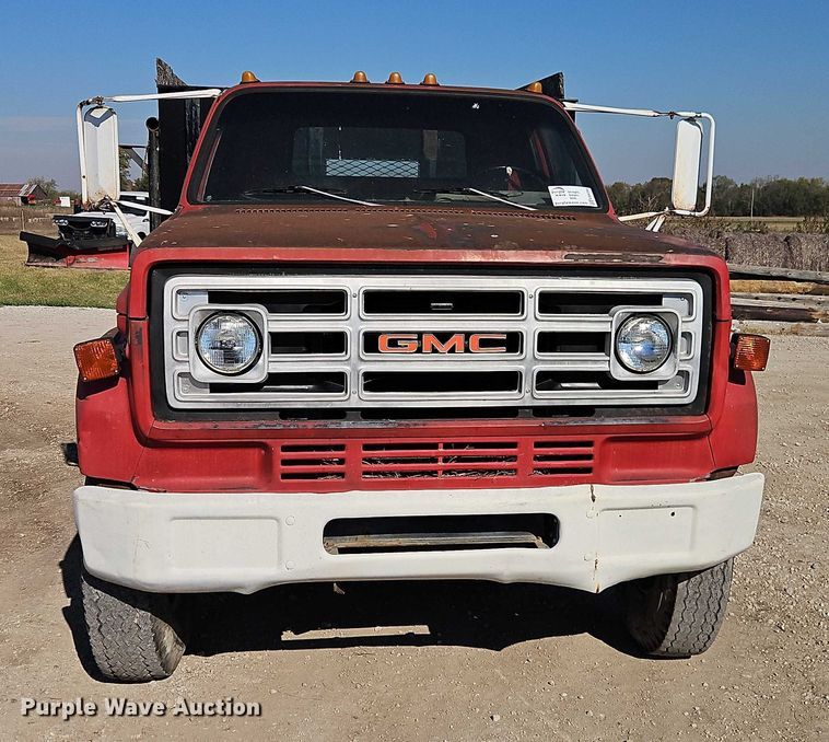 image for item EB8394 1986 GMC C6 dump flatbed truck