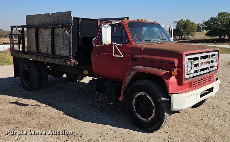 image for item EB8394 1986 GMC C6 dump flatbed truck