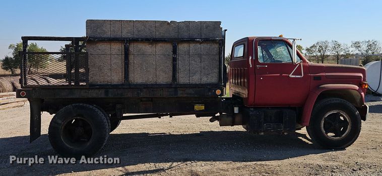image for item EB8394 1986 GMC C6 dump flatbed truck