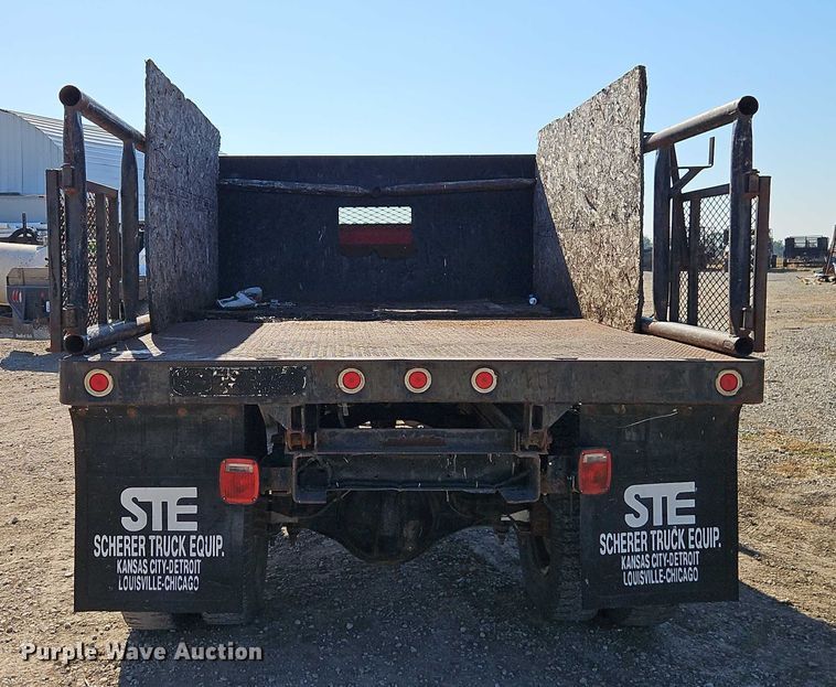 image for item EB8394 1986 GMC C6 dump flatbed truck