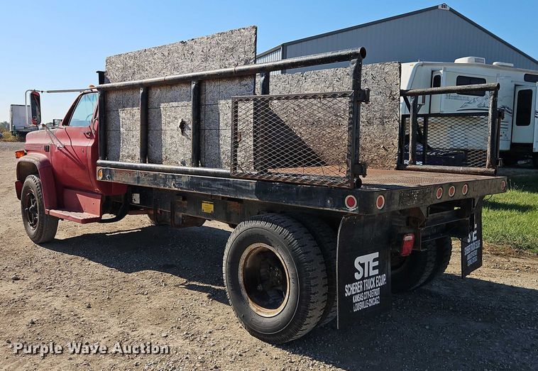 image for item EB8394 1986 GMC C6 dump flatbed truck