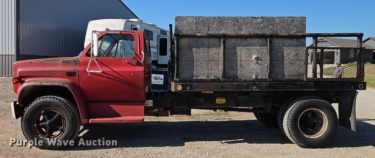 image for item EB8394 1986 GMC C6 dump flatbed truck