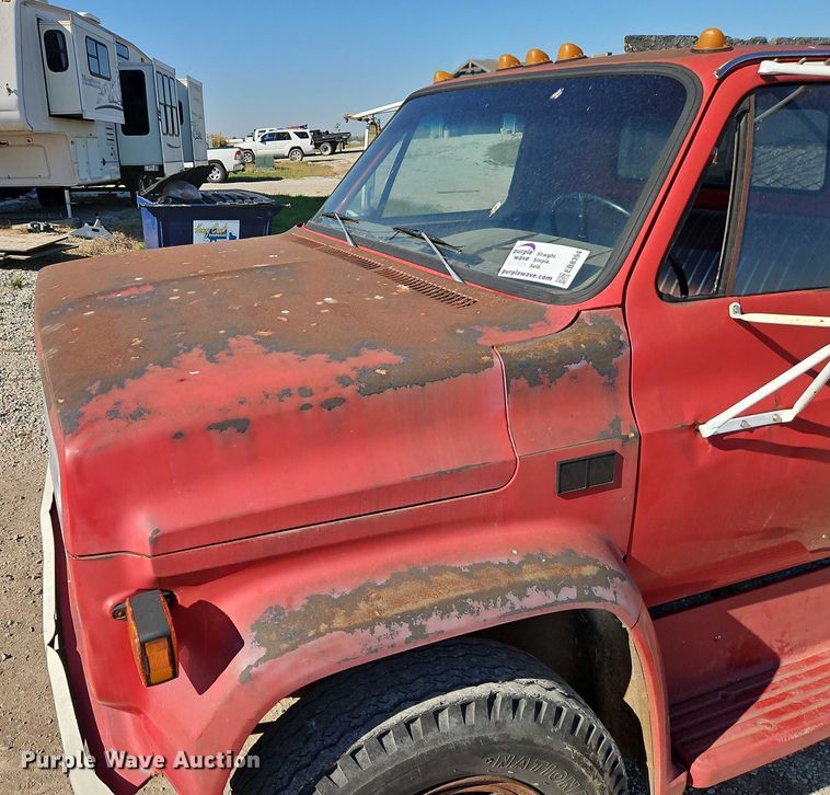 image for item EB8394 1986 GMC C6 dump flatbed truck