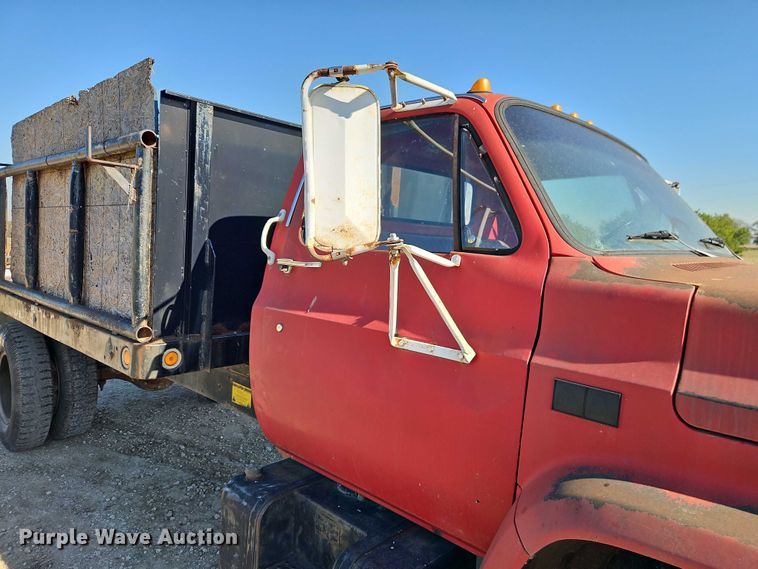 image for item EB8394 1986 GMC C6 dump flatbed truck