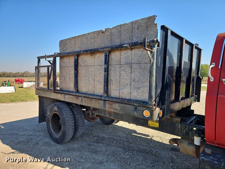 image for item EB8394 1986 GMC C6 dump flatbed truck