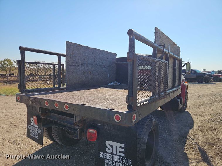 image for item EB8394 1986 GMC C6 dump flatbed truck