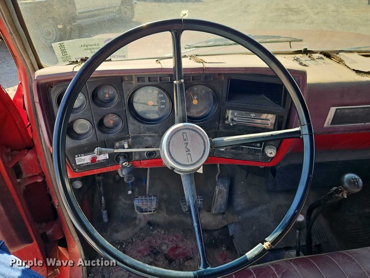 image for item EB8394 1986 GMC C6 dump flatbed truck