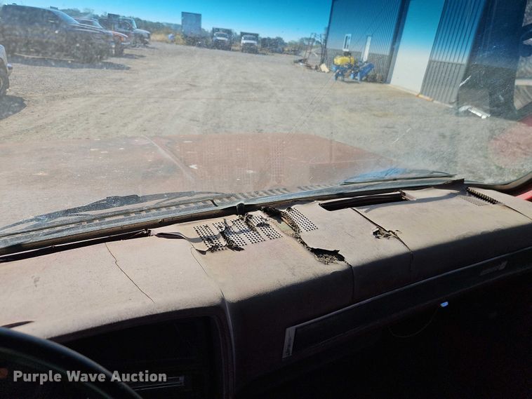 image for item EB8394 1986 GMC C6 dump flatbed truck