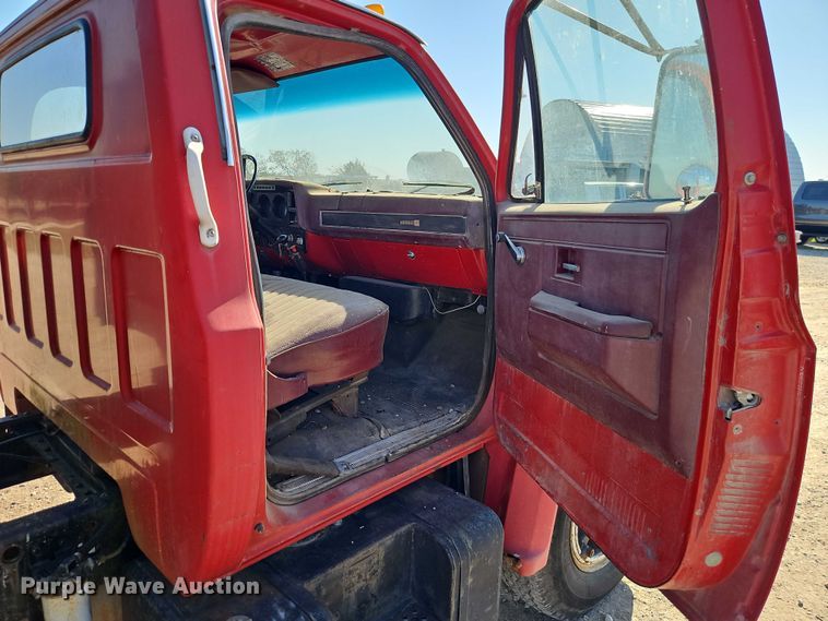 image for item EB8394 1986 GMC C6 dump flatbed truck