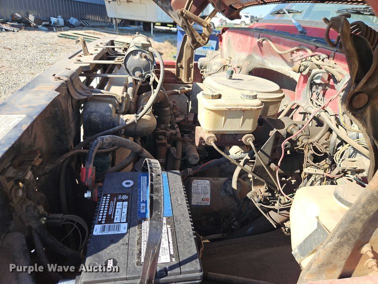 image for item EB8394 1986 GMC C6 dump flatbed truck