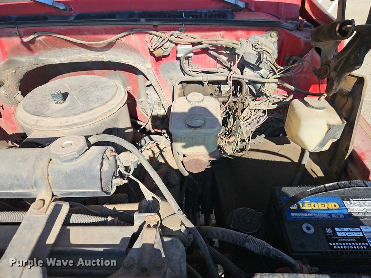 image for item EB8394 1986 GMC C6 dump flatbed truck