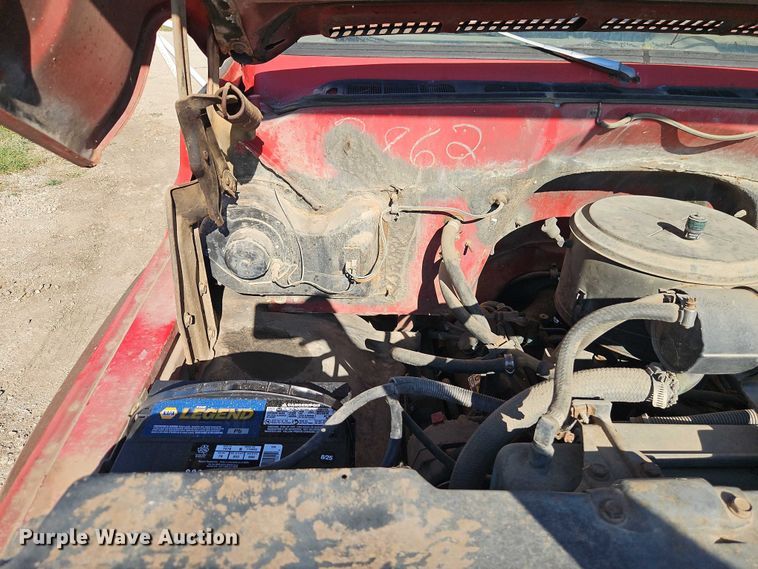 image for item EB8394 1986 GMC C6 dump flatbed truck