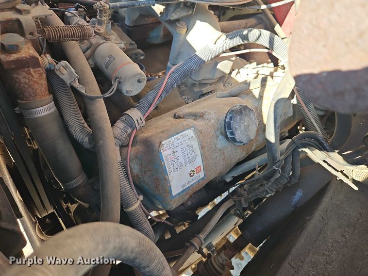 image for item EB8394 1986 GMC C6 dump flatbed truck