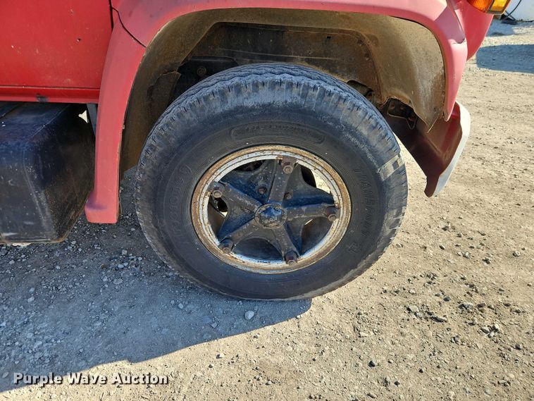 image for item EB8394 1986 GMC C6 dump flatbed truck