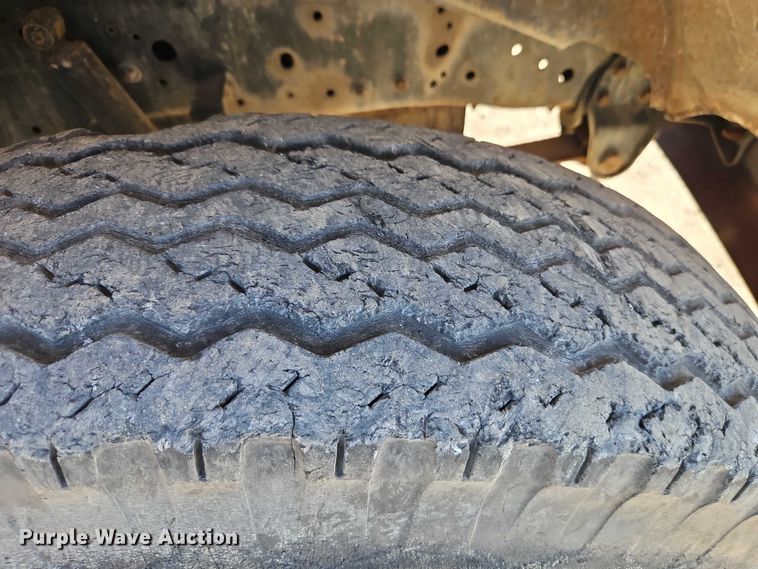 image for item EB8394 1986 GMC C6 dump flatbed truck