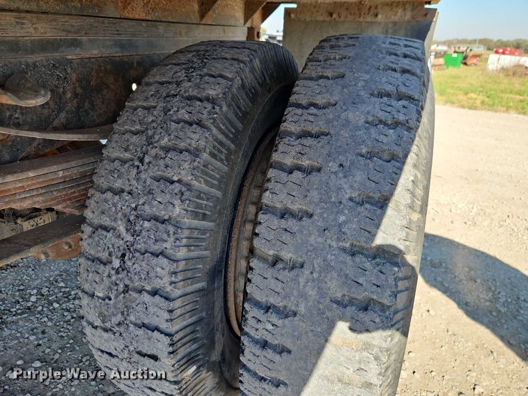 image for item EB8394 1986 GMC C6 dump flatbed truck